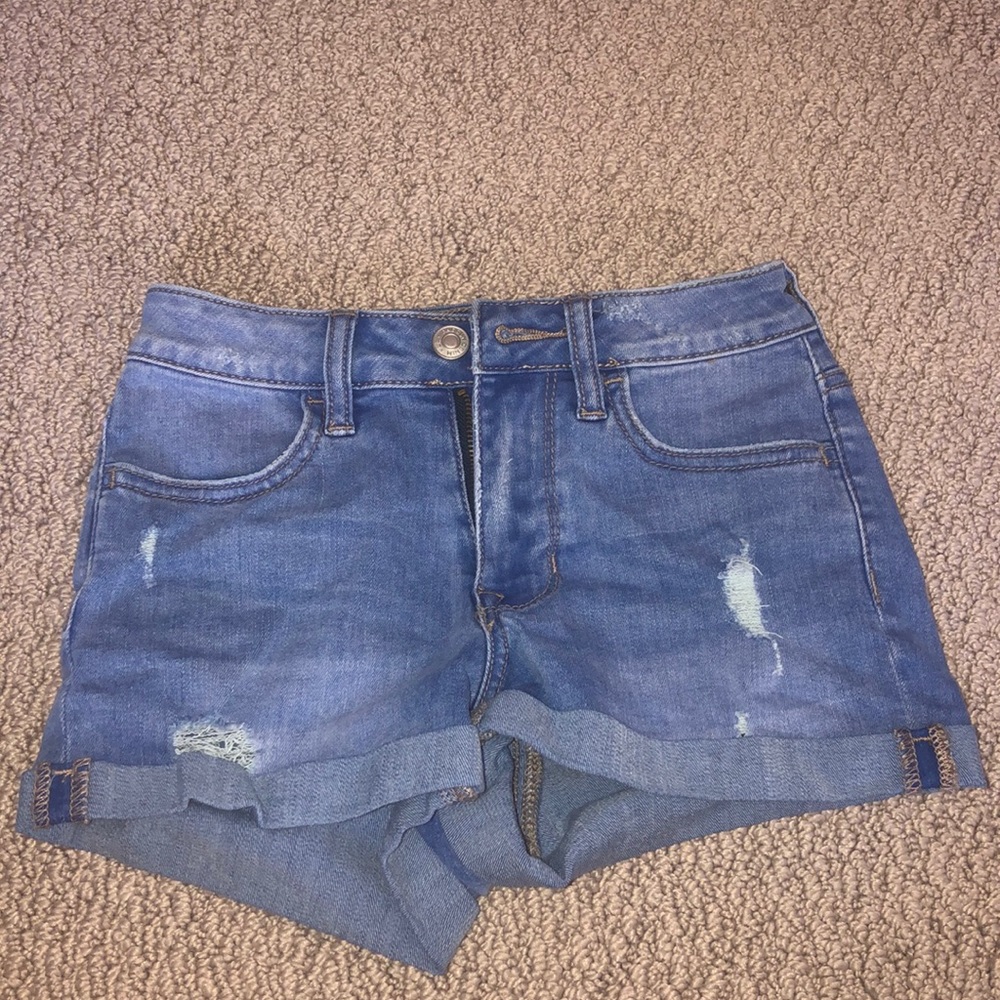 blue, slightly ripped PacSun jean shorts